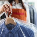 dry cleaners keeps clean clothes hangers bag